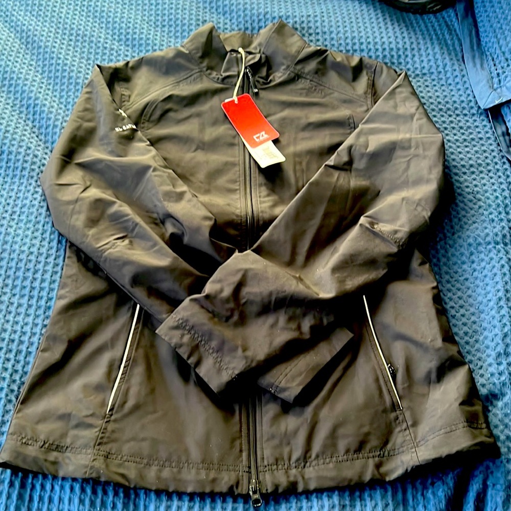 Light weight windbreaker, new with tags Cutter and Buck